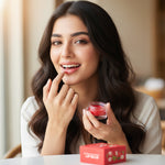 Applying strawberry lip balm for soft and smooth lips
